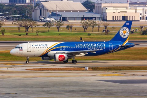 A Thai AirAsia Airbus A320 aircraft with registration HS-ABV and Leicester City Football Club special livery at Bangkok Don Mueang Airport