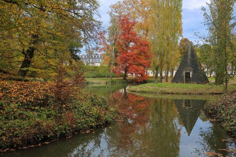 Pyramid at the pond during autumn with reflection