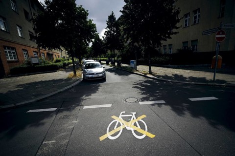 The pictogram for a cycle path in Ollenhauerstrasse in Berlin Reinickendorf has been crossed with a yellow marking. The new transport administration in Berlin has stopped several cycle path projects i...
