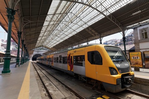 Historic platform hall with train of the state railway company Comboios de Portugal