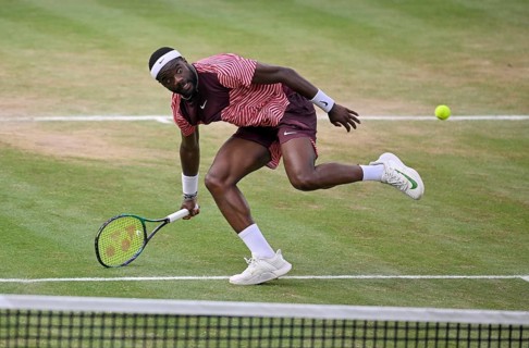 Frances Tiafoe USA converts his match point to win the title