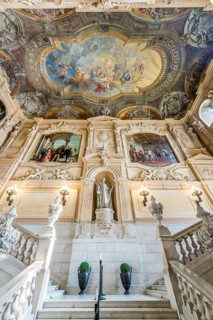 Staircase with sculptures of great Savoyards and glorifying ceiling fresco