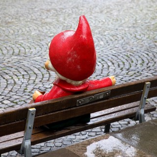 Sculpture of the Sandman on a bench