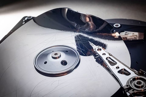 Detailed view of a destroyed computer hard disk. Berlin