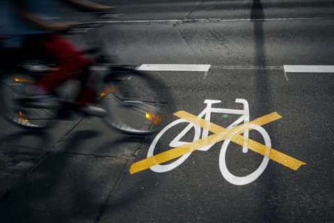 The pictogram for a cycle path in Ollenhauerstrasse in Berlin Reinickendorf has been crossed with a yellow marking. The new transport administration in Berlin has stopped several cycle path projects i...