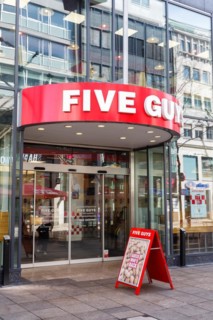 Five Guys brand fast food hamburger restaurant with logo on Koenigstrasse in Stuttgart