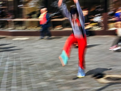 Colourful clown beats a wheel