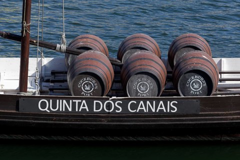 Port wine barrels Cockburns Quinta dos Canais on a historic boat on the river Douro Vila Nova de Gaia