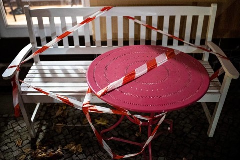 Barricaded tables and benches at a cafe in Berlin
