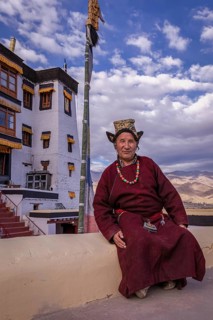Elderly man in traditional Ladakhi clothes
