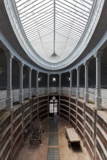 Oval funeral hall with glass dome