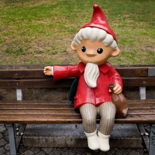 Sculpture of the Sandman on a bench