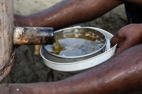 Bee keepers working in a bee farm near a mustards field in a village in Barpeta district of Assam in India on Wednesday 22 December 2021. The bee keeping business is one of the most profitable busines...