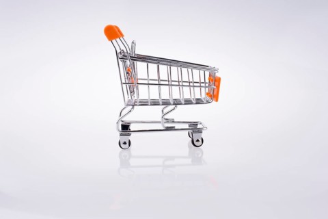 Hand holding a Cart on a white background