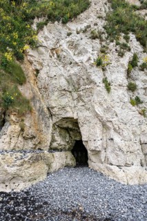 Cave entrance in the chalk cliff on the coast of St Margaret's at Cliffe