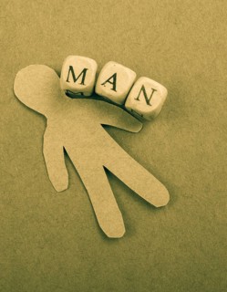 Paper man and man wording with letter cubes on paper