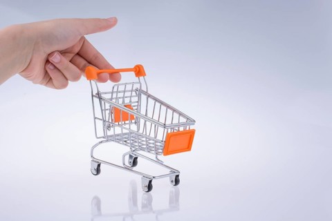 Hand holding a Cart on a white background