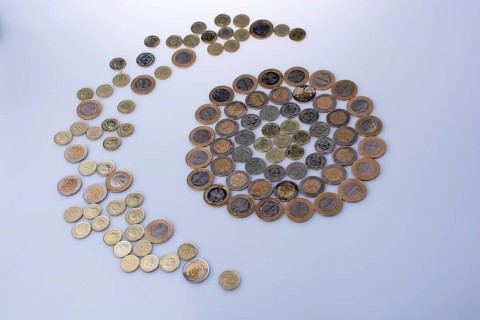 Turkish Lira coins shape a crescent round a circle object on white background