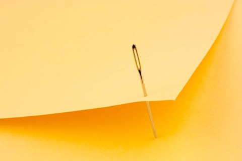 Needle pierced yellow color note paper