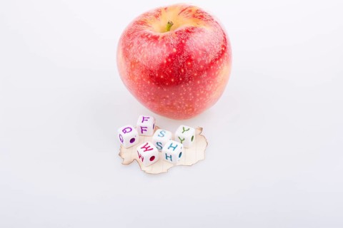 Back to school theme with a red apple