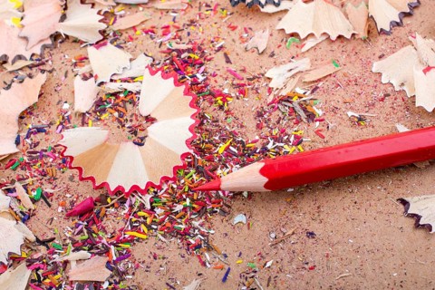 Red Color Pencil over some pencil shavings