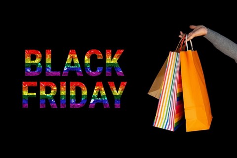 LGBT. Shopping bags in the woman hands. Joy of consumption. Purchases
