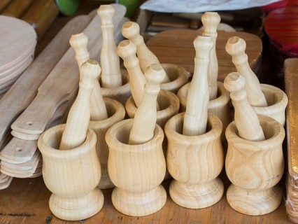 Wooden mortars and pestles as a traditional kitchenware