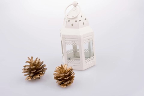 Little white bird house made of metal