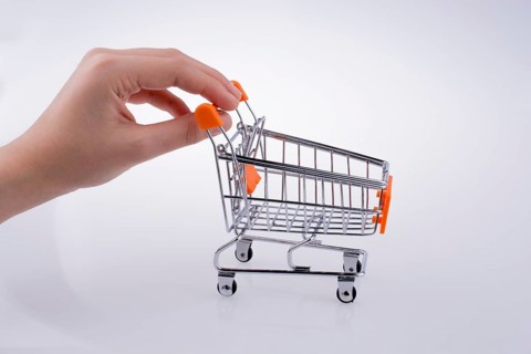 Hand holding a Cart on a white background
