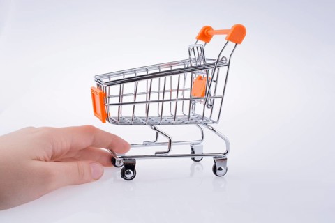 Hand holding a Cart on a white background
