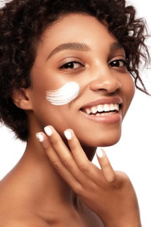 African American skincare models with perfect skin and curly hair. Beauty spa treatment concept