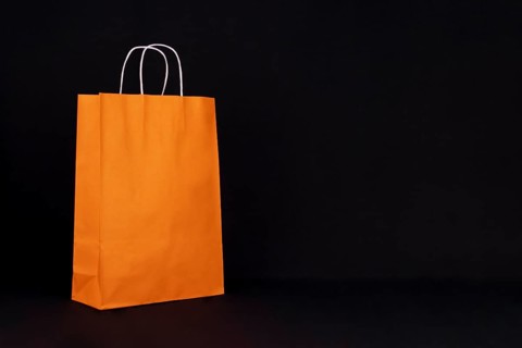 Unbranded shopping bag on black background