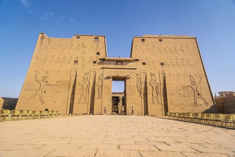 Facade with drawing of pharaohs of the Temple of Edfu in the city of Edfu