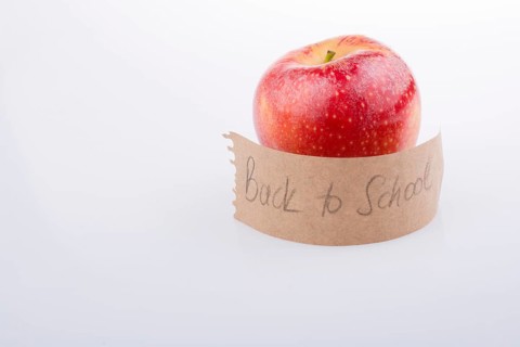 Back to school theme with a red apple