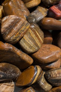 Tiger's eye and hawk's eye gemstone as natural mineral rock specimen