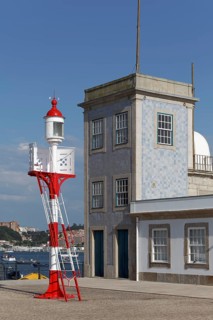 Historic lighthouse of Sao Miguel-O-Anjo and building of the Portuguese rescue organisation Instituto de Socorro a Naufragos