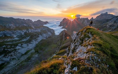 Mountaineer at sunrise at Rotsteinpass