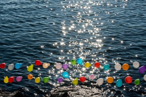 Balloon on a string on water for shooting game