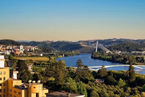 View of Mondego River with Ponte Rainha Santa Isabel and Ponte Pedro e Ines