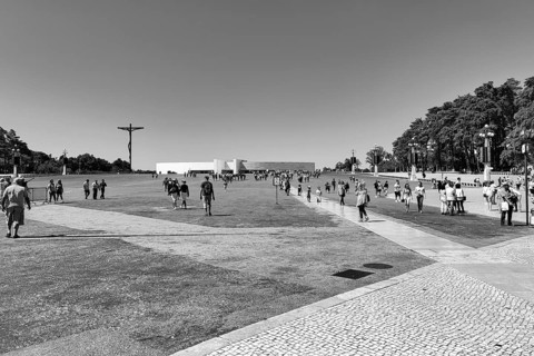 Pilgrims and tourists on forecourt