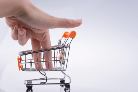 Hand holding a Cart on a white background