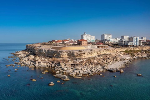 Aerial of the sandstone cliffs and promenade in Aktau