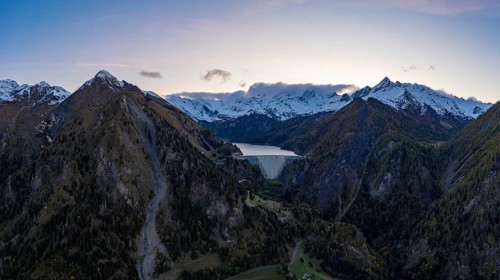 Aerial view of the Lago di Luzzone reservoir with the surrounding mountains in the Valle di Blenio