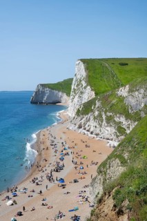 Bathing Beach on the South of England Chalk Coast at Durdledoor