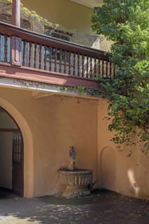Copy of the historic Dolphin Rider Fountain in a courtyard