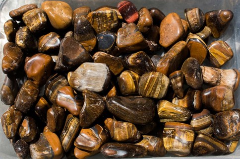 Tiger's eye and hawk's eye gemstone as natural mineral rock specimen