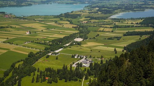 Panorama from the Tegelberg massif to the baroque church of St. Coloman