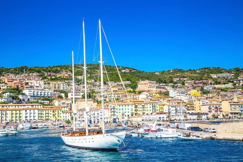 Two-master sailing boat leaving the harbour