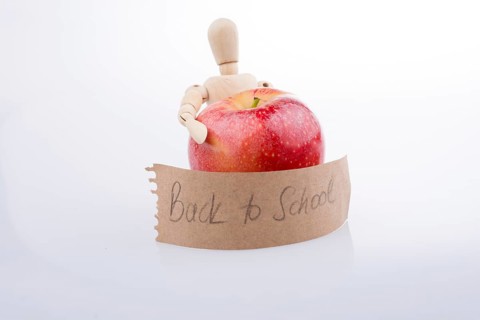 Back to school theme with a red apple