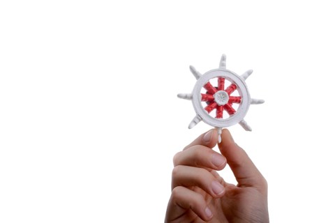 Isolated Ship steering wheel onhand